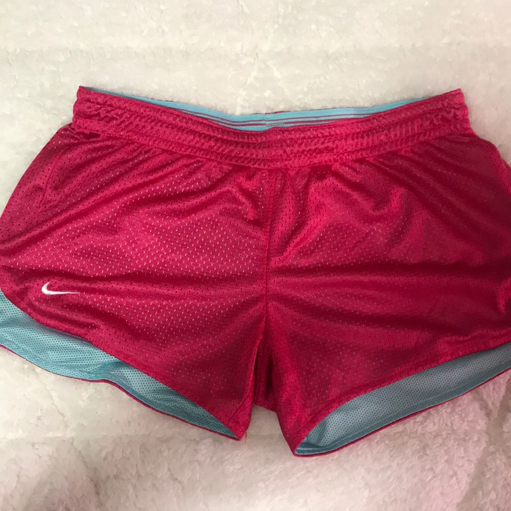 Dark pink with light blue lining Nike shorts